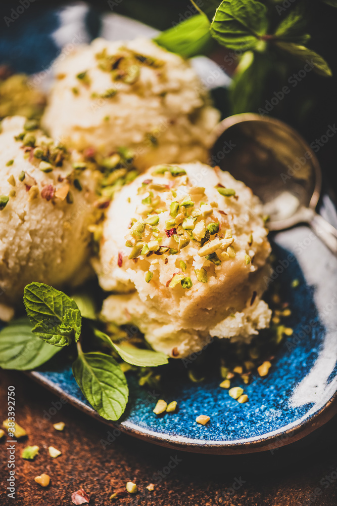 Turkish traditional dessert semolina helva. Close-up of scoops of sweet semolina helva with pistachi