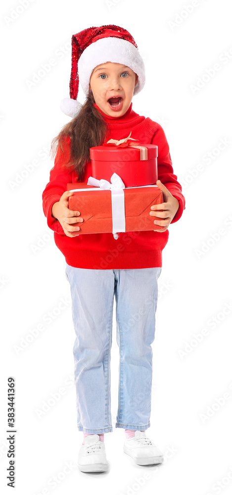 Surprised little girl in Santa hat and with gift boxes on white background