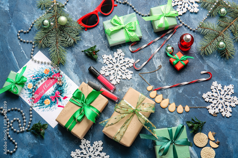 Christmas composition with cosmetics on color background