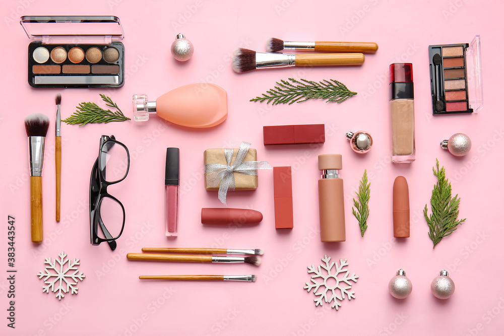 Christmas composition with cosmetics on color background