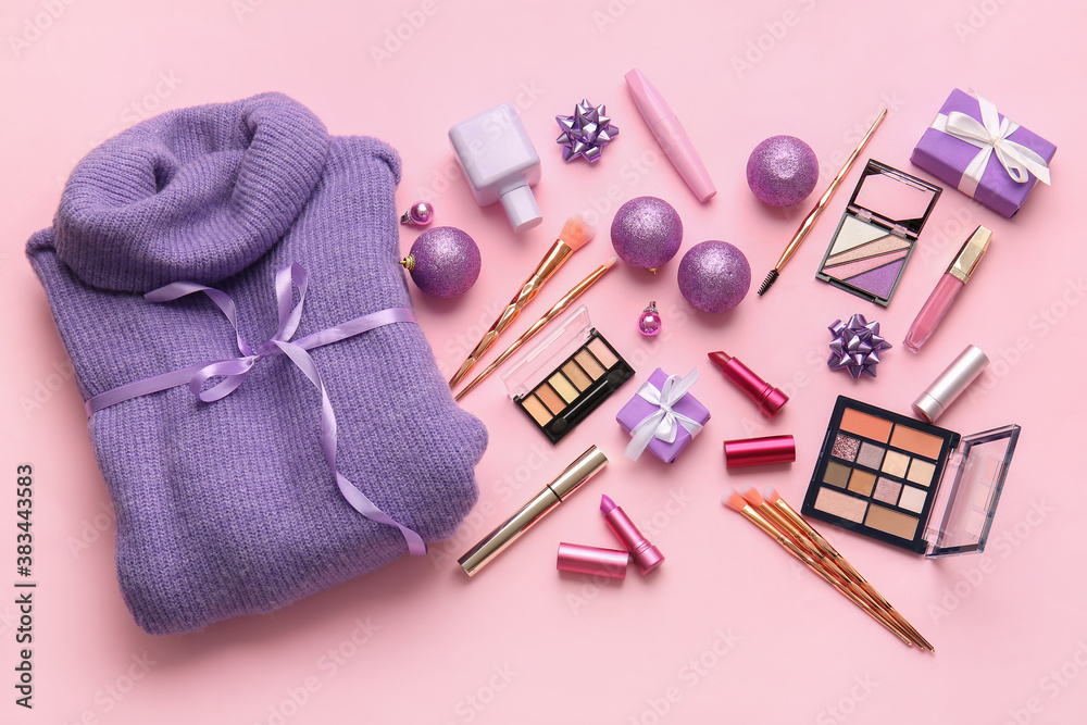 Christmas composition with cosmetics on color background