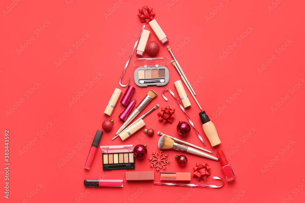 Christmas composition with cosmetics on color background