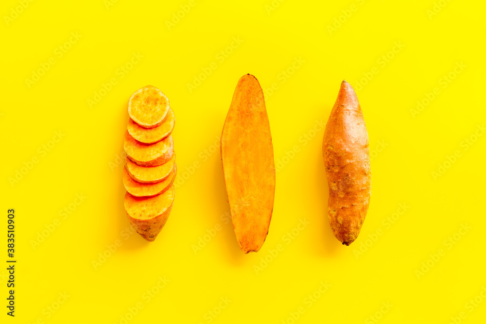 Pattern with sweet potato - yams. Organic vegetables background, overhead view