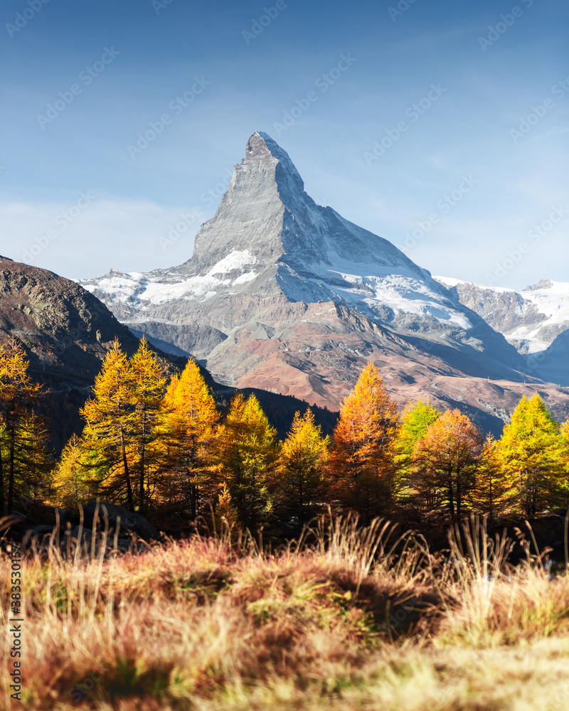 Incredible colorful sunrise on Grindjisee lake with Matterhorn Cervino peak in Swiss Alps. Zermatt r