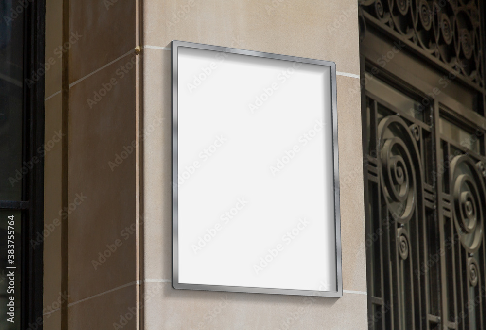 Metal frame hanging in street mockup. Template of a picture framed on a wall bathed in sunlight 3D r