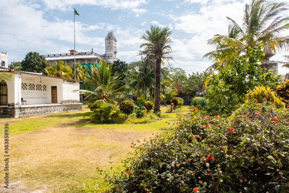 Stone Town, Zanzibar. Courtyard and a garden of Peoples Palace Museum, with tropical plants and pal