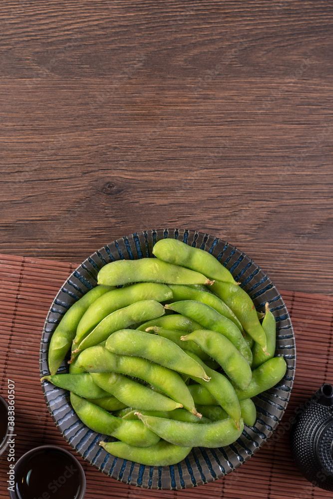 Top view of fresh boiled edamame with copy space.