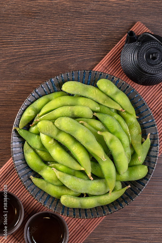 Top view of fresh boiled edamame with copy space.