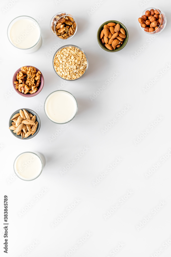 Glasses of non-dairy vegan milk - lactose free nuts and grain drink. Top view