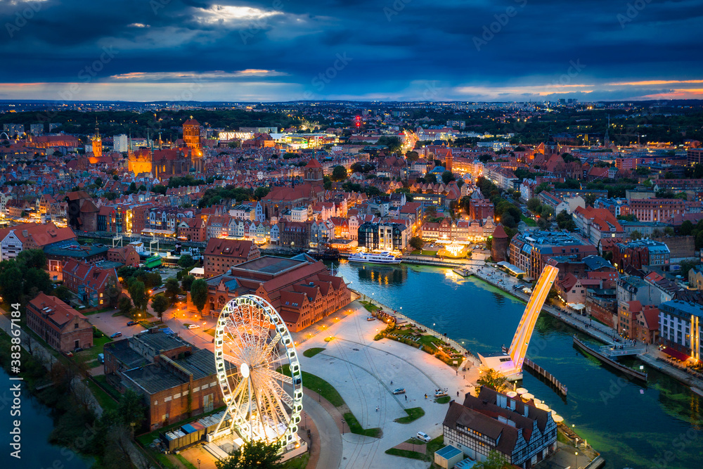 Aerial view of the Gdansk city over Motlawa river with amazing architecture at dusk,  Poland