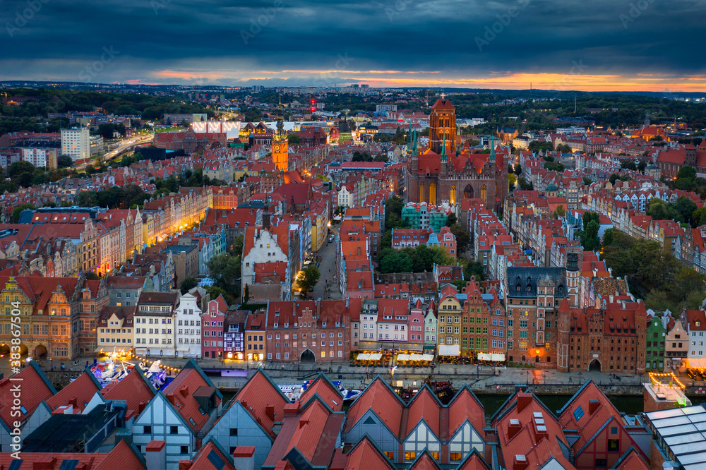 Aerial view of the Gdansk city over Motlawa river with amazing architecture at dusk,  Poland