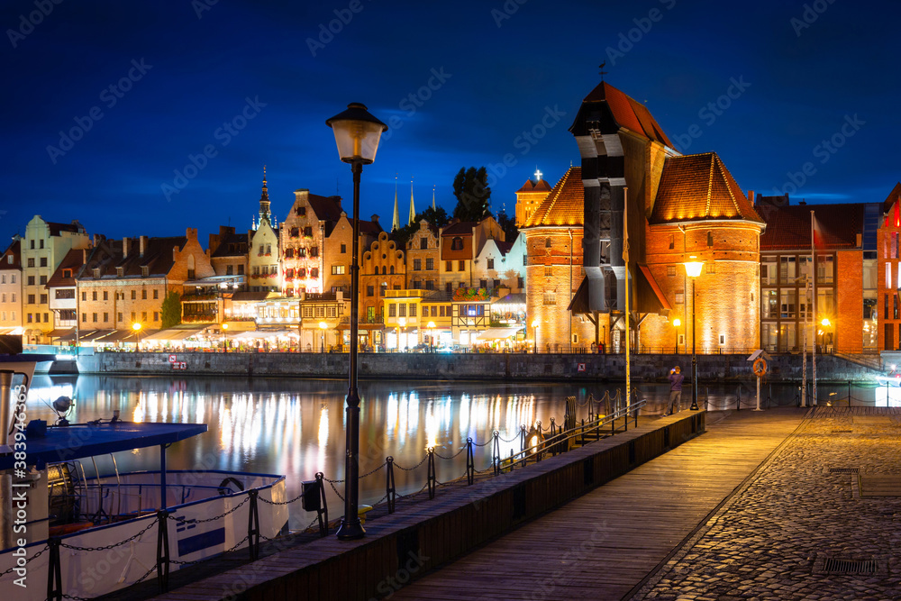 Historical Port Crane over the Motlawa river in Gdansk at dusk,  Poland