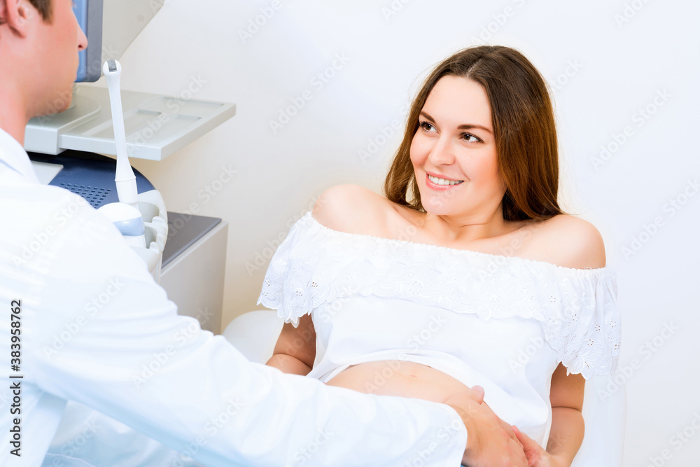 pregnant woman on reception at the doctor