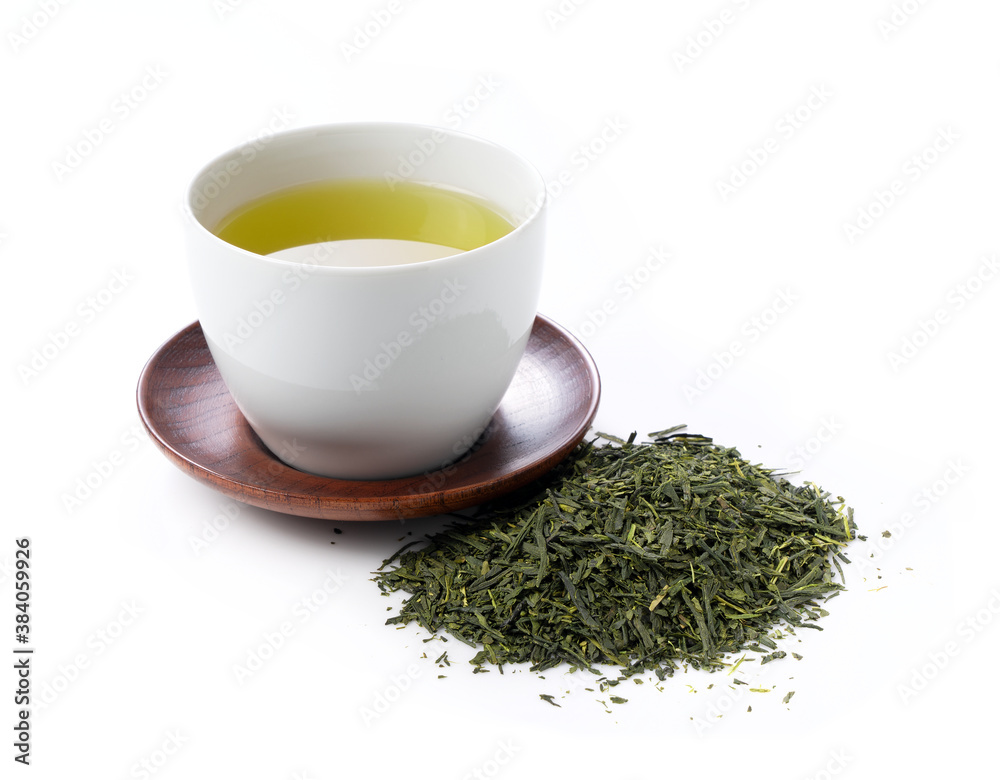 Green tea and tea leaves on a white background