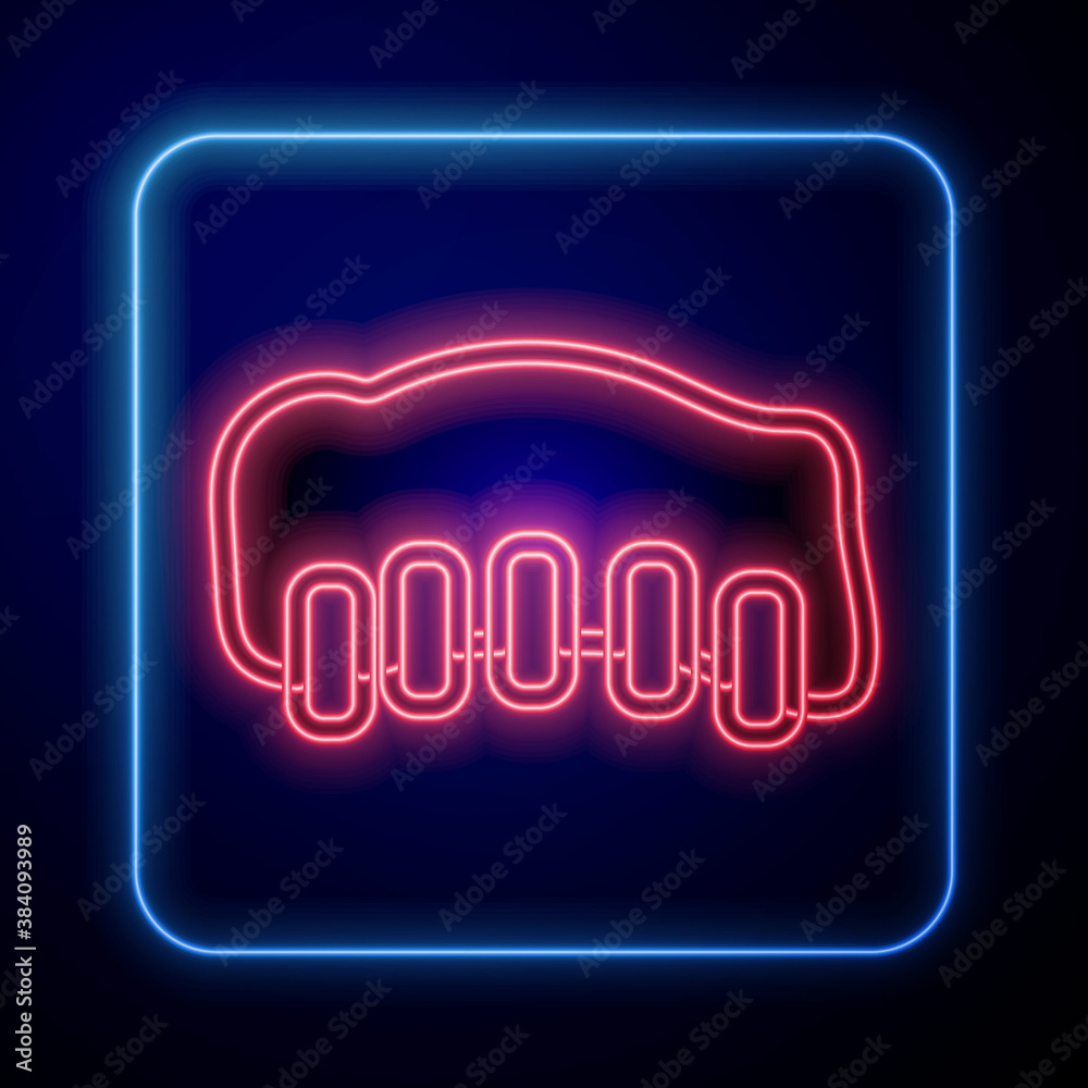 Glowing neon Grilled pork bbq ribs icon isolated on blue background. Vector.