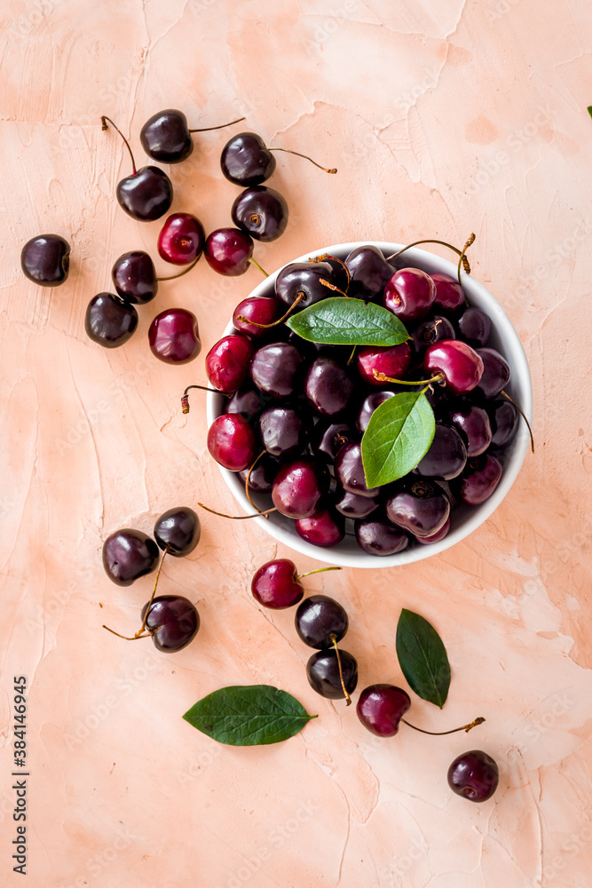 Red sweet cherry texture or wallpaper. Flat lay of berries, top view