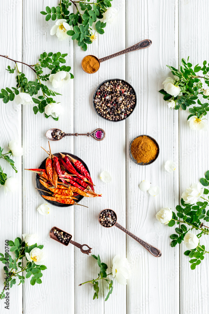 Overhead view of hot spice. Red pepper and paprika with cooking utensils