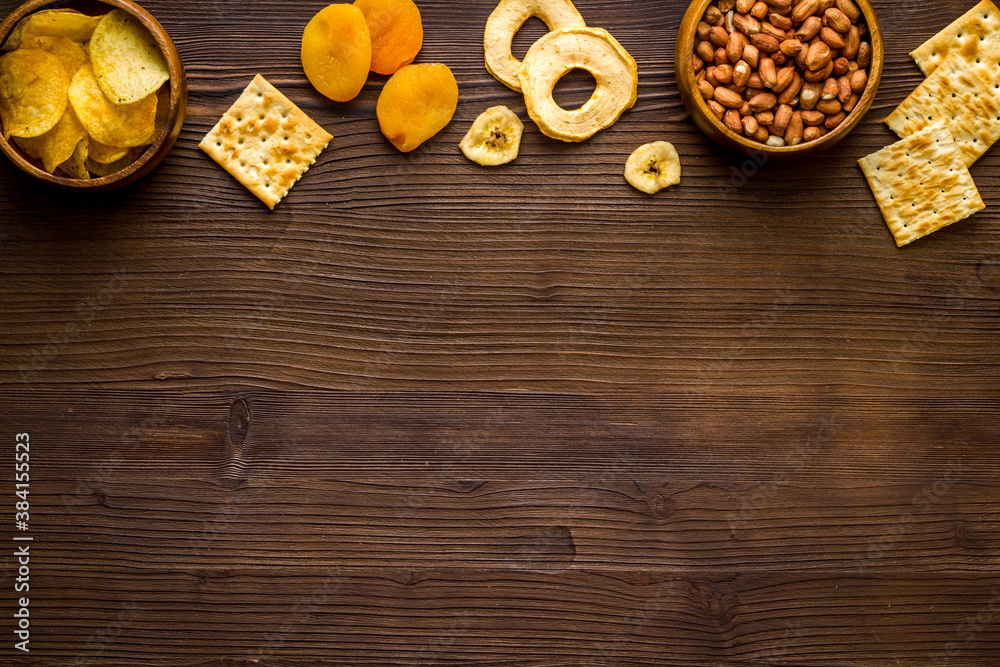 Mix of snacks - nuts and dried fruits, flat lay, top view