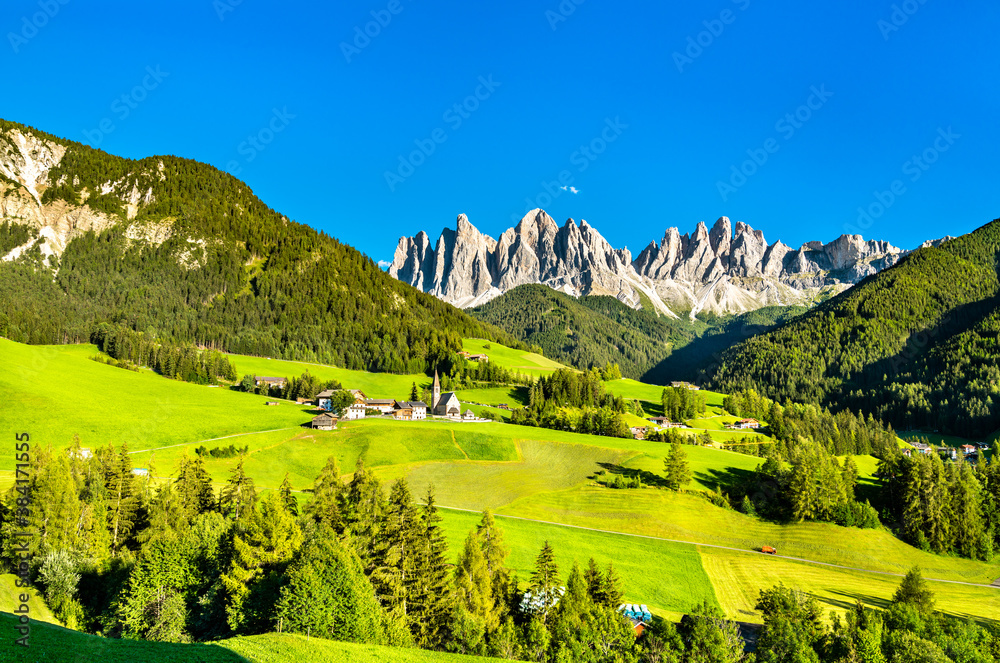 View of Val di Funes with the Chruch of Santa Maddalena in the Dolomites Mountains. UNESCO world her