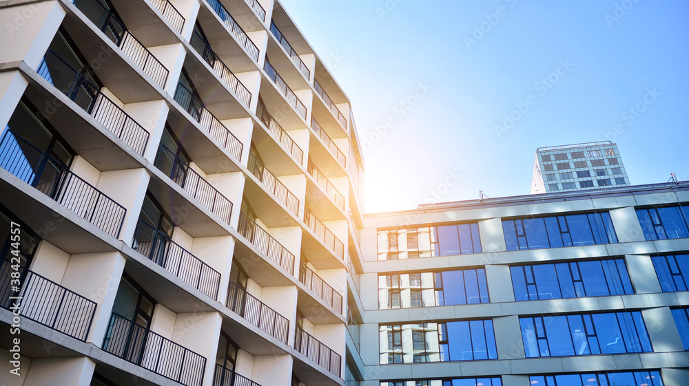 Apartment residential house and home facade architecture and outdoor facilities. Blue sky on the bac