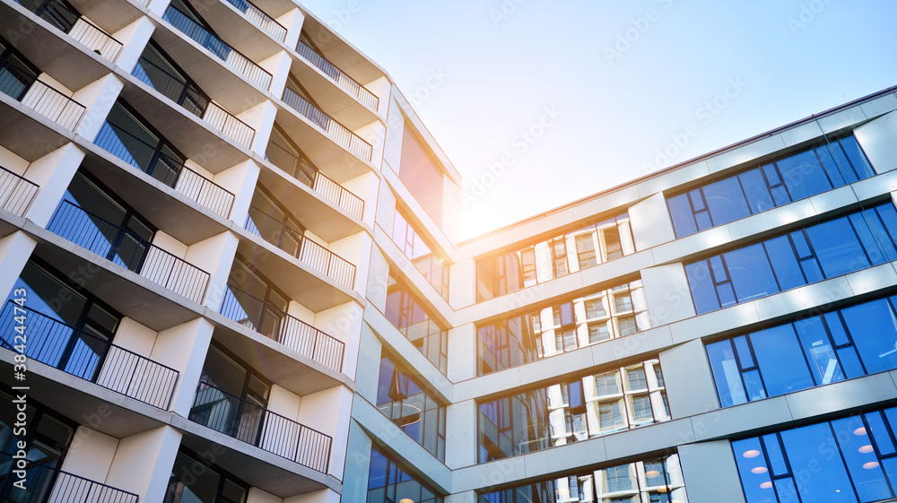 Apartment residential house and home facade architecture and outdoor facilities. Blue sky on the bac