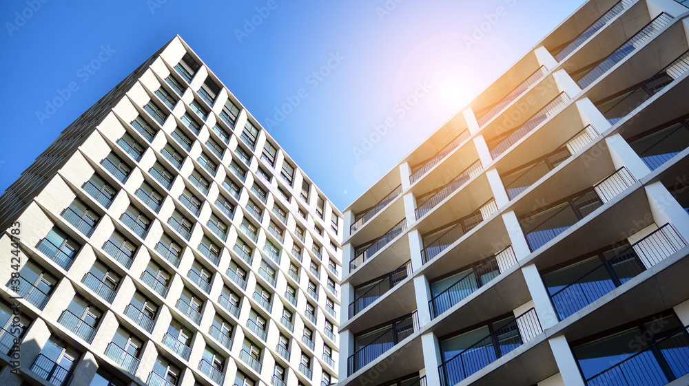 Apartment residential house and home facade architecture and outdoor facilities. Blue sky on the bac