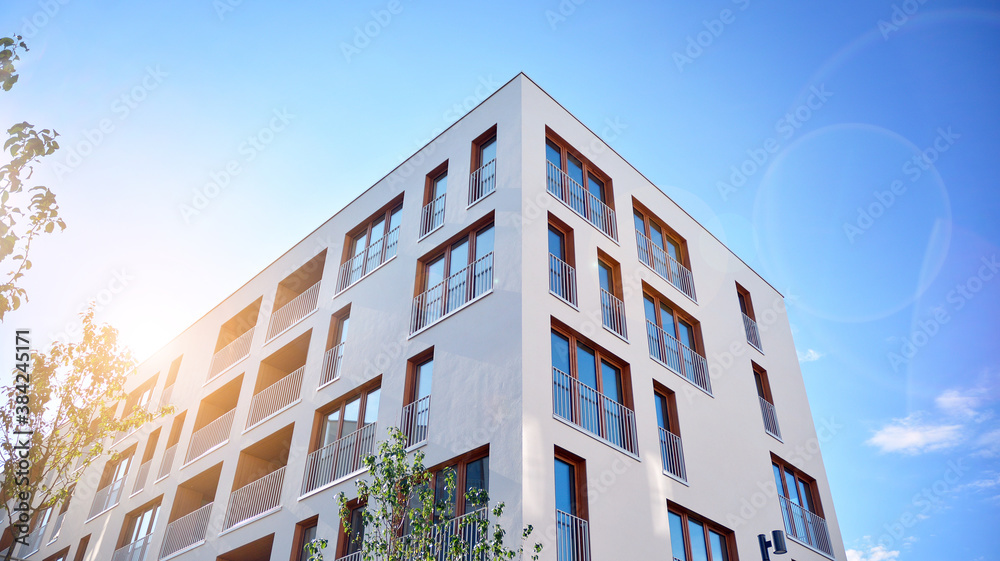 Apartment residential house and home facade architecture and outdoor facilities. Blue sky on the bac