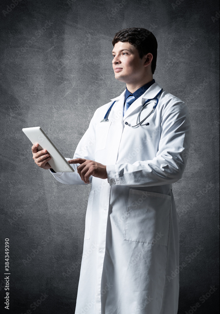 Doctor with a computer tablet