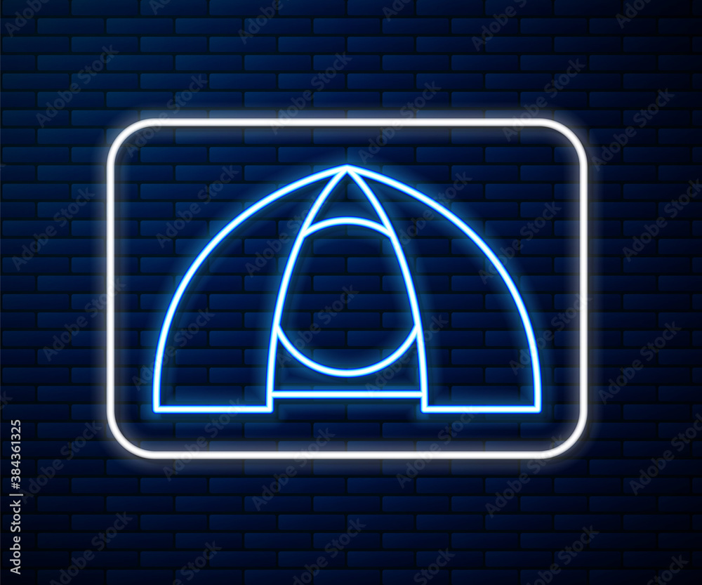 Glowing neon line Tourist tent icon isolated on brick wall background. Camping symbol. Vector.