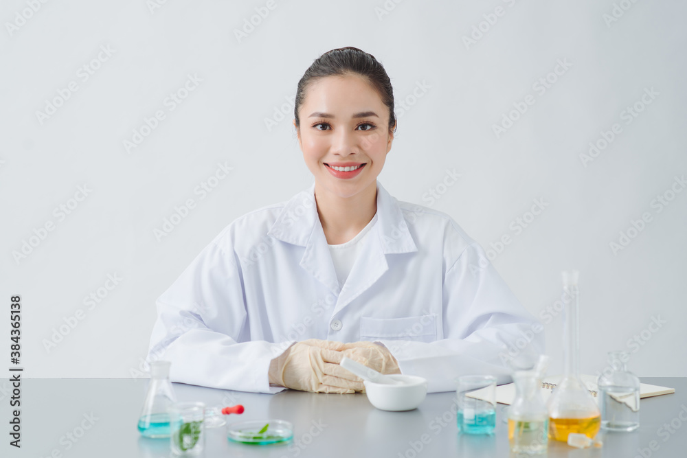 the scientist, dermatologist formulate organic natural cosmetic product in the laboratory