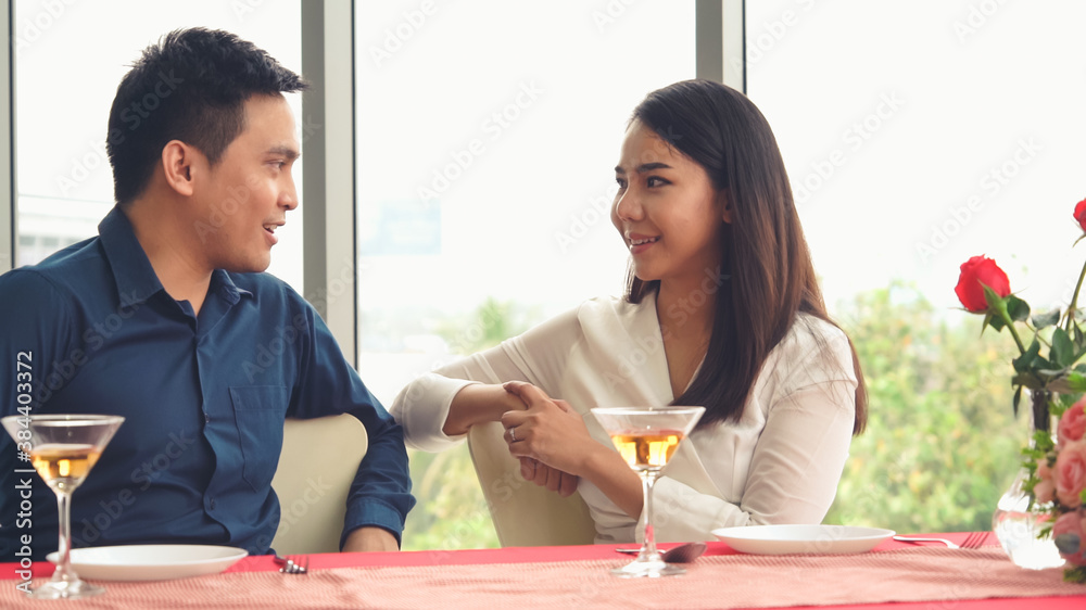 Happy romantic couple eating lunch at restaurant . Couple anniversary celebration and lifestyle .