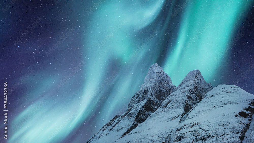 Sky background with northern lights. Aurora borealis on Lofoten islands, Norway. Northern lights abo