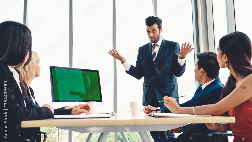 Business people in the conference room with green screen chroma key TV or computer on the office tab