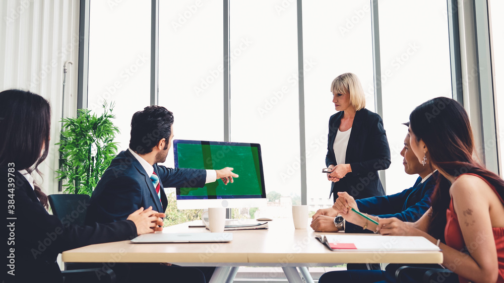 Business people in the conference room with green screen chroma key TV or computer on the office tab