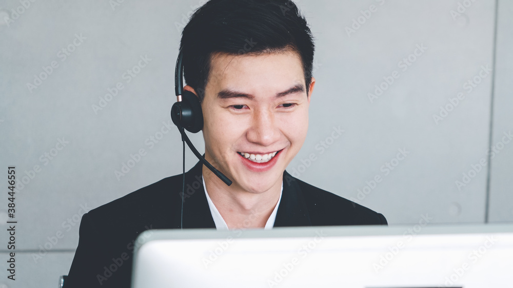 Business people wearing headset working in office to support remote customer or colleague. Call cent