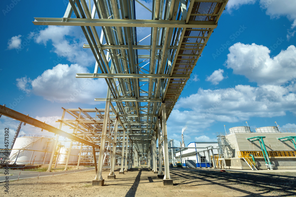 Pipeline oil and gas refinery plant form industry zone with sunrise and cloudy sky, oil and gas indu