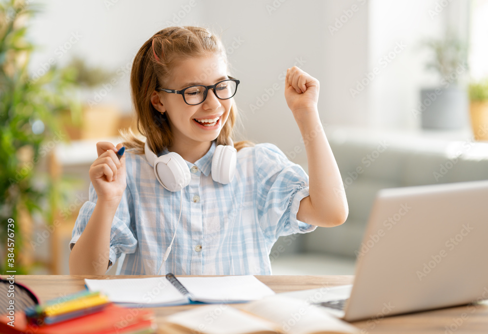 Girl doing homework or online education.