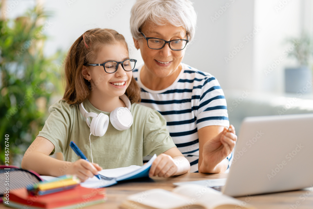 Girl doing homework or online education.