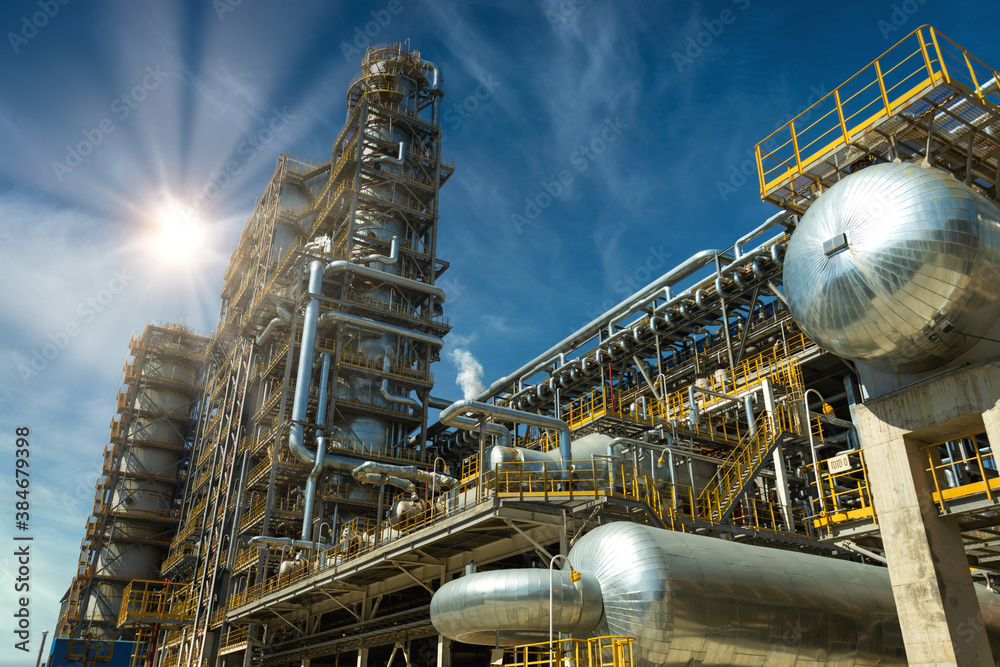 Close up Industrial view at oil and gas refinery plant form industry zone with sunrise and cloudy sk