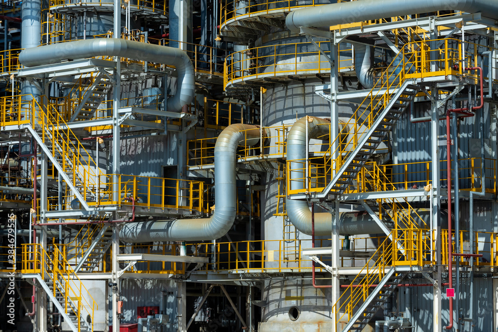 Close up of Pipeline oil and gas refinery plant form industry zone with sunrise and cloudy sky, oil 