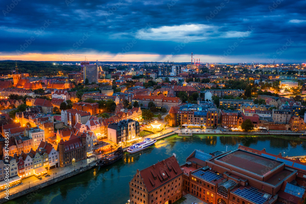 Aerial view of the Gdansk city over Motlawa river with amazing architecture at dusk, Poland