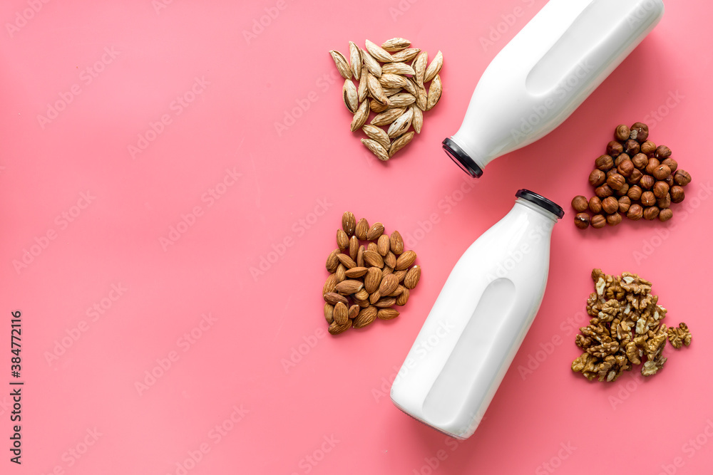 Bottles of non-dairy vegan milk - lactose free nuts and grain drink. Top view