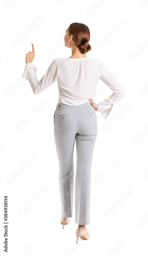 Young businesswoman with raised index finger on white background