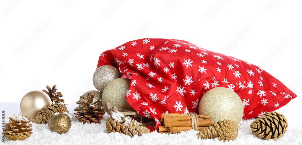 Santa bag with gifts and decor on white background