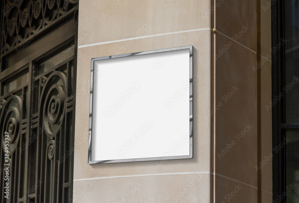 Metal frame hanging in street mockup. Template of a picture framed on a wall bathed in sunlight 3D r