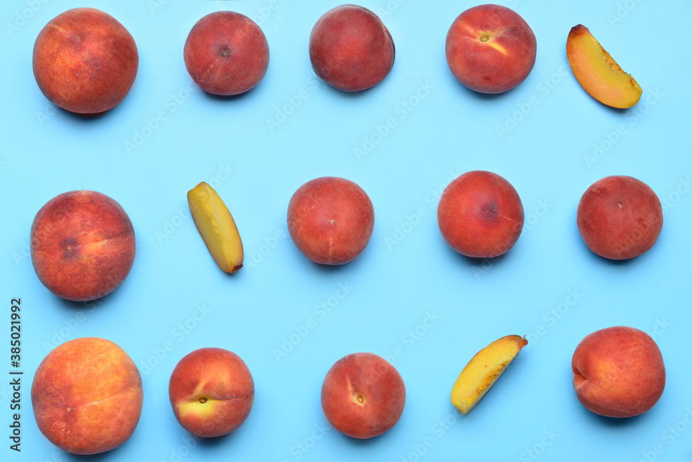 Sweet peaches on color background