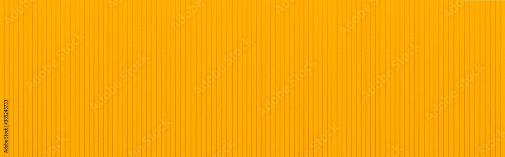 Panorama of Yellow plastic wall with stripes texture and background