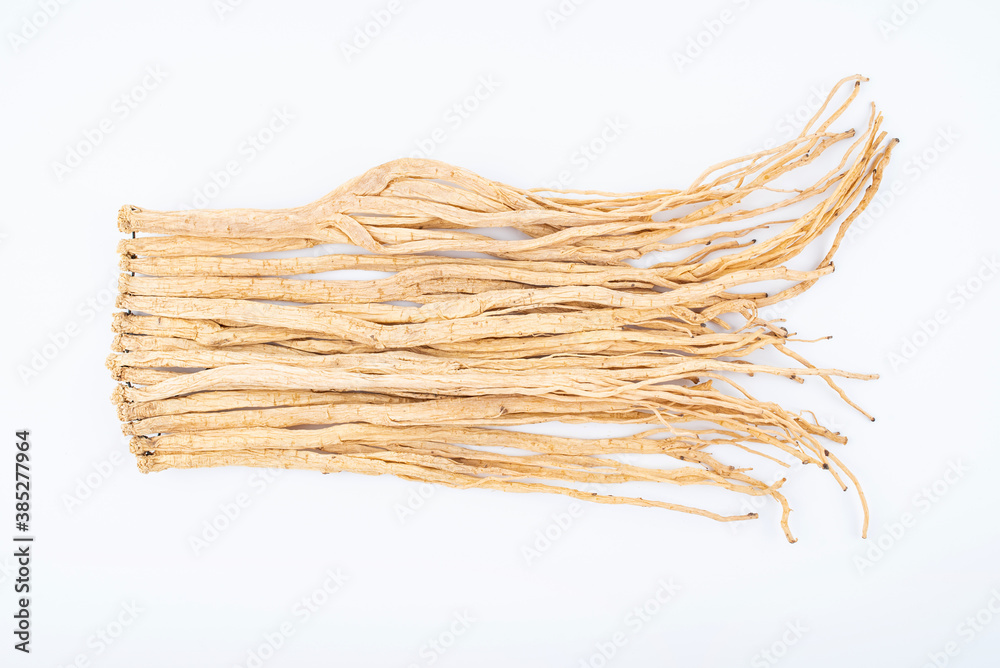 A handful of Chinese herbal medicine Codonopsis on white background