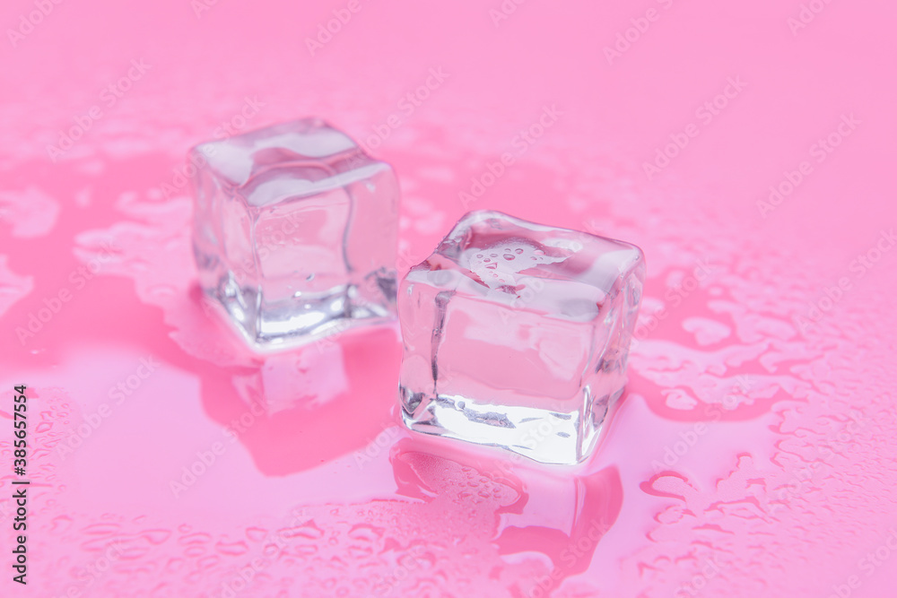 Ice cubes on color background