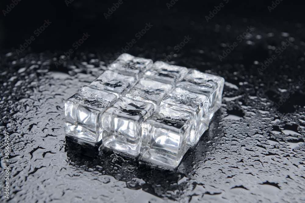 Ice cubes on dark background